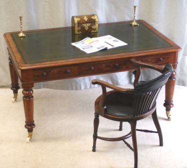 Click here to view Gallery - Antique six drawer mahogany library table